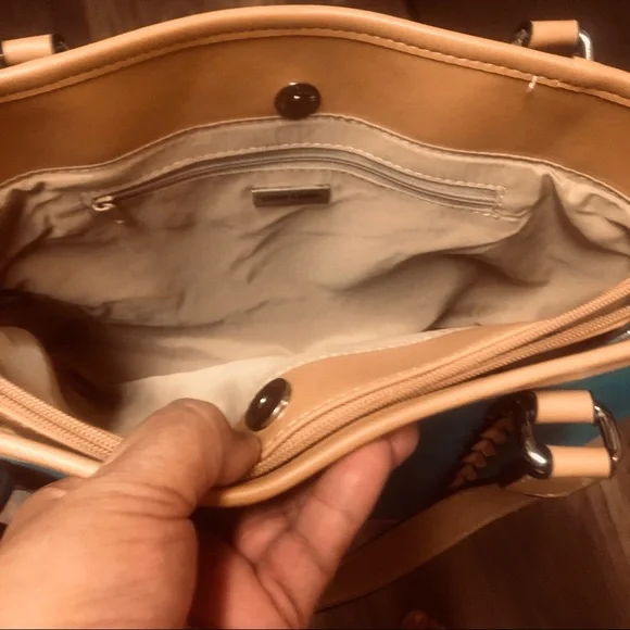 The turquoise bag has tan braided accent.  3 sections to hold your items. - Picture 3 of 5